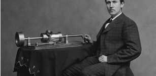 Photograph of Edison with his phonograph (2nd model), taken in Mathew Brady's Washington, D.C. studio in April 1878