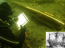 Archaeologist Jon Adams sketching the figurehead before it is raised to the surface. (Photo: Johan Rönnby, Södertörn University)