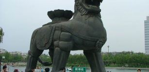Majestic gigantic cast-iron lion at Cangzhou, Hebei Province was manufactured in 953 AD. It weighs over 37 tons.