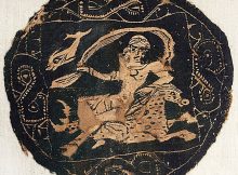 Black roundel with a nereid, or sea nymph, riding a dappled marine horse, and a dolphin behind the nereid’s shawl (Egypt, 4th-7th Century CE), natural linen and natural and black wool, 9 ½ x 9 ¾ inches (Gift of the Estate of Rose Choron, Godwin-Ternbach Museum)