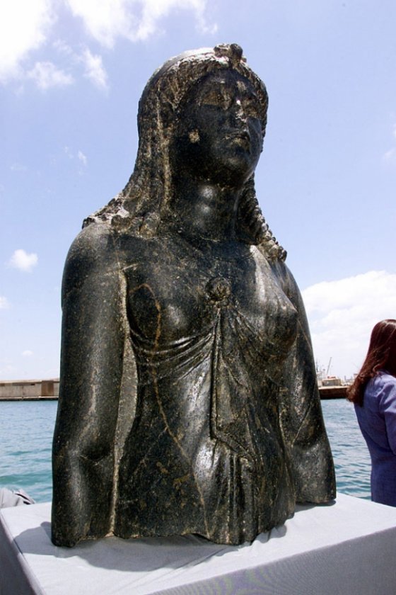The statue of the Goddess Isis sits on display on a barge in an Alexandria naval base June 7, 2001.