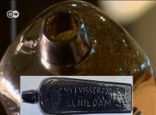 gin bottle with ancient message