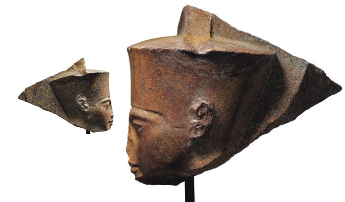 This image released by Christie's on Tuesday, June 11, 2019, shows a 3,000-year-old stone sculpture of the famed boy pharaoh Tutankhamun at Christie's in London. Egypt is trying to halt the auction of the sculpture of Tutankhamun at Christie's in London. The Foreign Ministry issued a statement late on Monday saying Egyptian authorities demand the auction house provide documents proving the artifact's ownership. (Christie's via AP)