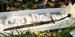 Real-Life Excalibur Found Underwater In Bosnia - Medieval Sword In Stone Baffles Archaeologists