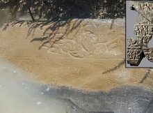 A tip from a local Turkish farmer led archaeologists to this stone half-submerged in an irrigation canal. Inscriptions from the 8th century B.C. are still visible. Credit: James Osborne