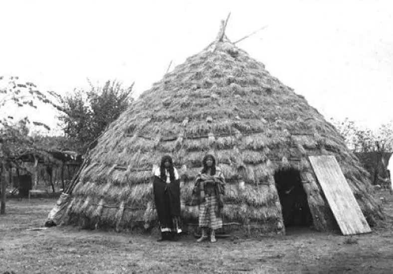 Courtesy Photo. Wichita dwellings had a distinctive shape and were constructed from straw and wood.