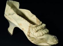 This handout photo taken by the auction house Osenat shows a white shoe that once belonged to Queen Marie-Antoinette, made of silk and goatskin, that will be auctioned on Nov. 15, 2020, in Versailles, on Oct. 5, 2020. (AP Photo)