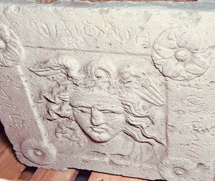Etruscan Urn With Skillfully Adorned Medusa Relief Discovered In The Palazzone Necropolis, Perugia, Italy Etruscan Urn With Skillfully Adorned Medusa Relief Discovered In The Palazzone Necropolis