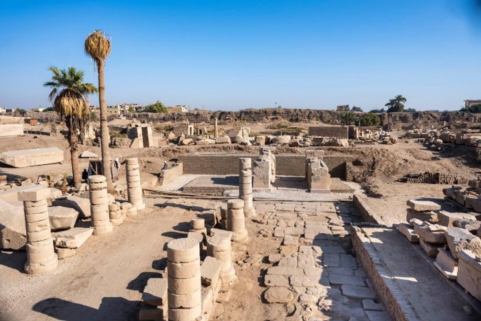 Rare Stone Stela Of Emperor Tiberius Standing Before The Theban Triad, Unearthed During Restoration Of The Gate Of Ramses III at Karnak, Egypt Rare Stone Stela Of Emperor Tiberius Standing Before The Theban Triad, Unearthed During Restoration Of The Gate Of Ramses III at Karnak, Egypt